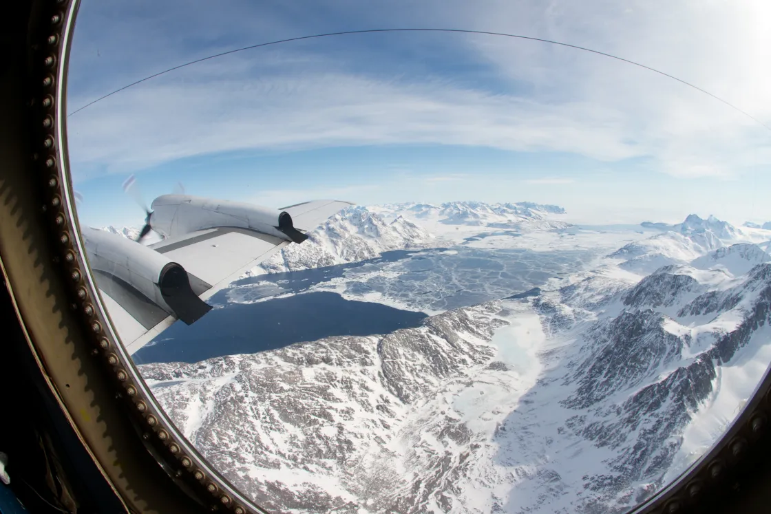 Icy water in the fjord of the Kangerdlugssuaq Glacier in eastern Greenland, as seen from NASA's P-3B aircraft during an Operation IceBridge flight. Diverse data on the Arctic, including IceBridge data, can be discovered through the Arctic Data Explorer. Image Credit: NASA/Jefferson Beck.