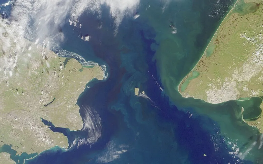 Terra satellite image uses the multi-angle imaging spectroradiometer (MISR) instrument to visualize the Bering Strait, with the Chukchi Sea to the north. Russia is on the left, Alaska is on the right.