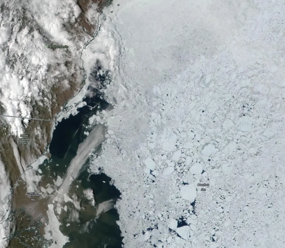 Color image shows sea ice off the coast of Alaska in the Beaufort Sea, taken by the Moderate Resolution Imaging Spectroradiometer (MODIS) sensor on the NASA Terra satellite on June 26, 2021. 