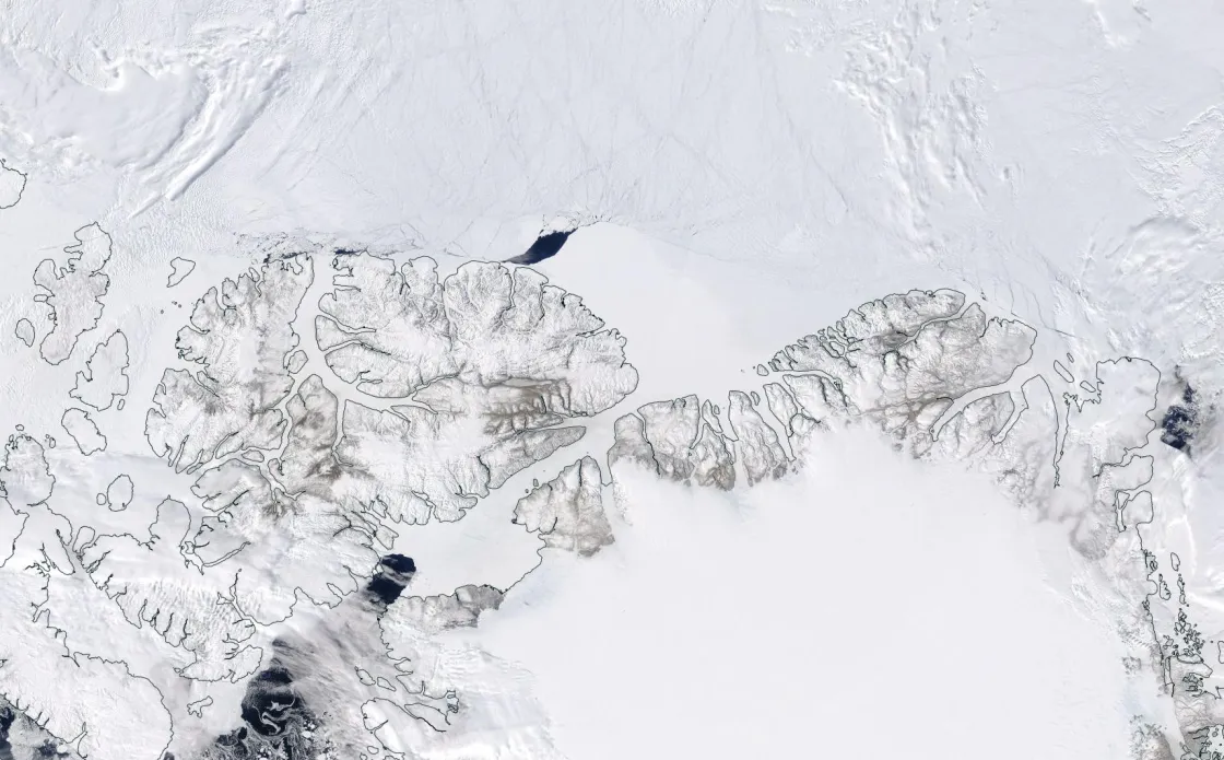 NASA Moderate Resolution Imaging Spectroradiometer (MODIS) image from May 20, 2020, shows a large polynya, or open water region, that formed north of Ellesmere Island in Canada.