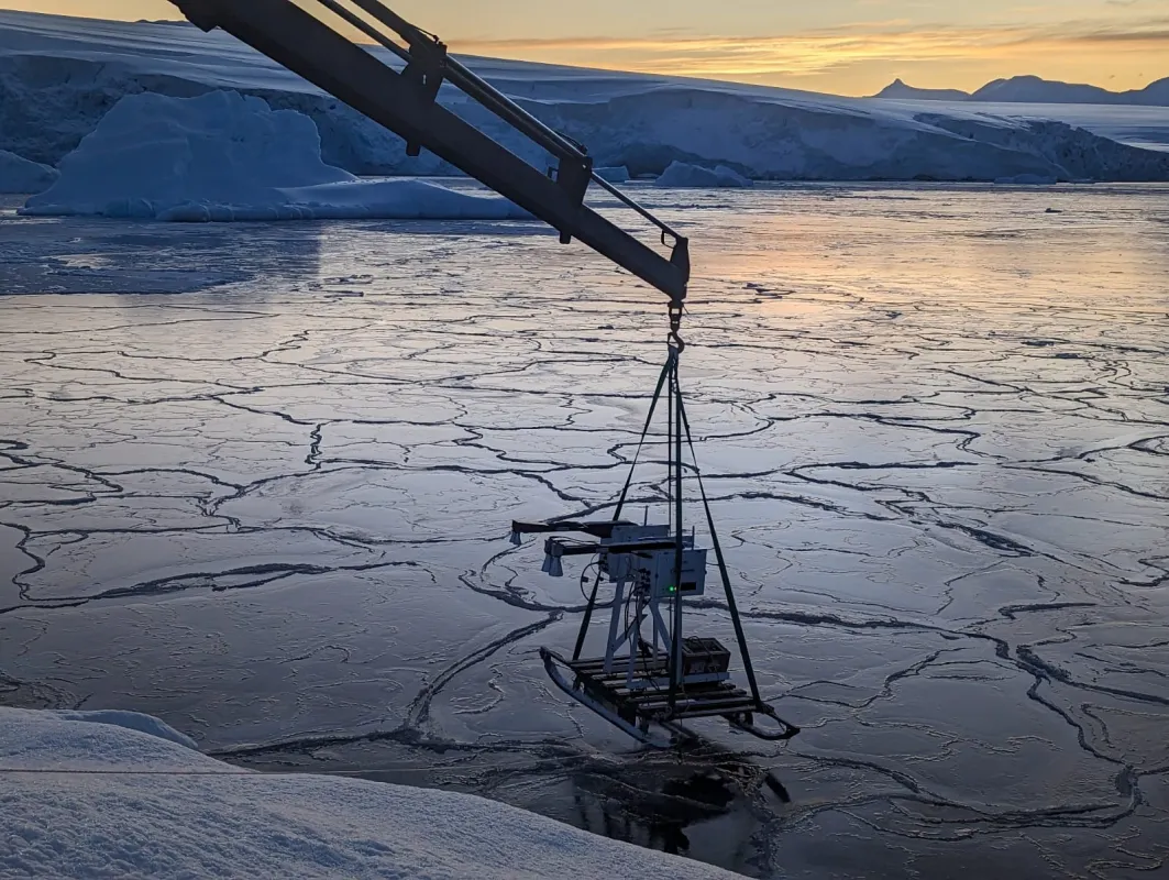 This photo shows the Ku- and Ka-band radar being deployed over newly forming sea ice off the coast of the Antarctic Peninsula near Rothera Station.