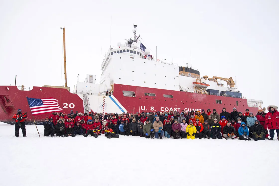 Scientists and the crew of U.S. Coast Guard Icebreaker Healy have their portrait taken at the North Pole on September 7, 2015. The Healy reached the pole on September 5.