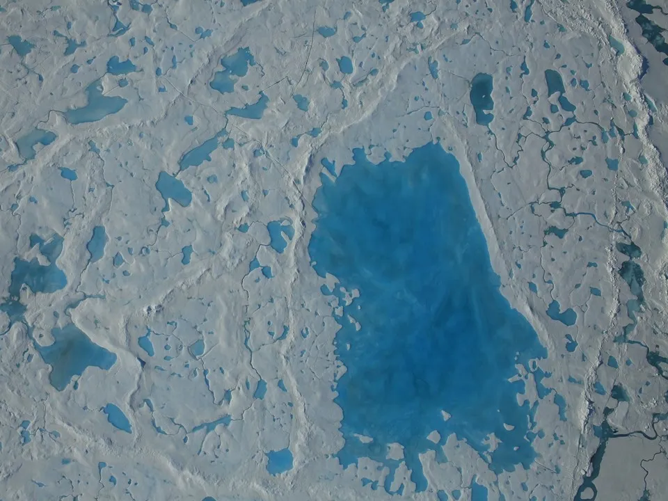 Photograph of melt ponds on the surface of Artic sea ice