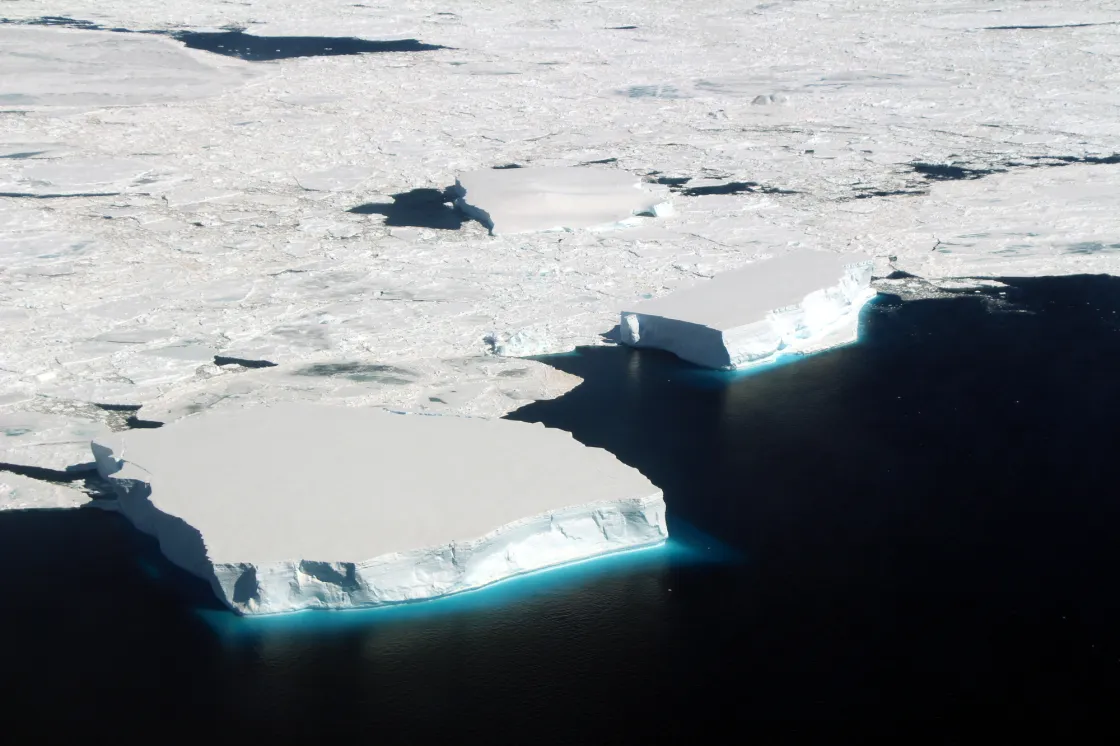 Small tabular icebergs are seen in the marginal ice zone of the northern Weddell Sea on November 22, 2017 during a NASA Operation IceBridge flight.