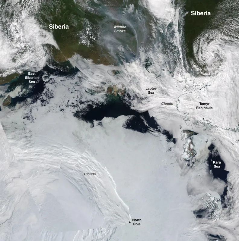 This true-color composite image shows broken up sea ice on the Siberian coast, taken by the Moderate Resolution Imaging Spectroradiometer (MODIS) sensor on the NASA Terra satellite on July 12, 2020. Also visible is the smoke from wildfires surging in Siberia.