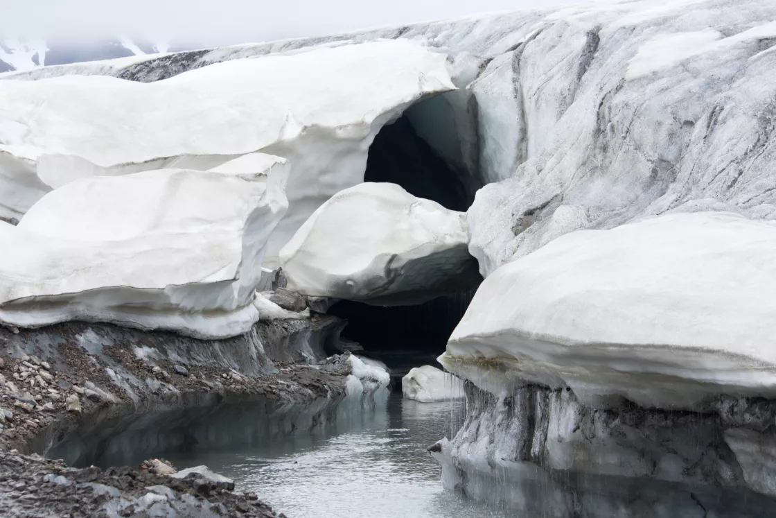 A glacier river, also a source of carbon, melts into the Arctic Ocean in Spitsbergen, the largest and only permanently inhabited island of Norway’s Svalbard archipelago. Melting glaciers, which will alter river flow, will further impact the Arctic Ocean carbon cycle. Photo credit: Kitty Terwolbeck, flickr.com