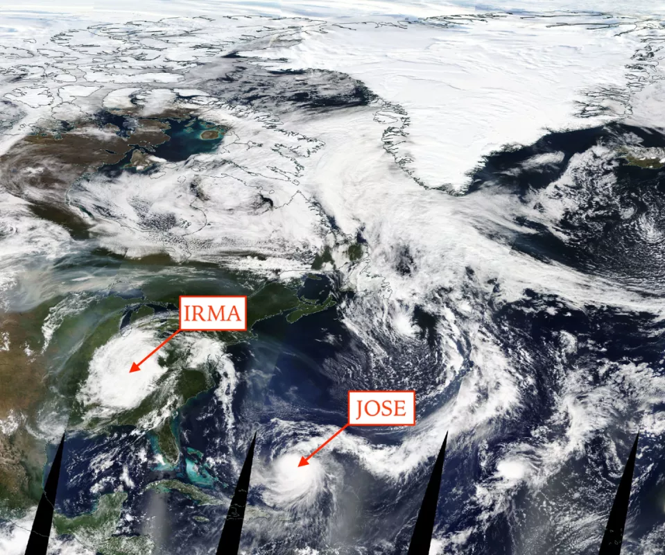 In this Moderate Resolution Imaging Spectroradiometer (MODIS) true color image, remnants of Hurricane Irma pass over southeastern United States. Meanwhile, a warm air mass south of Greenland is causing surface air temperatures to rise.