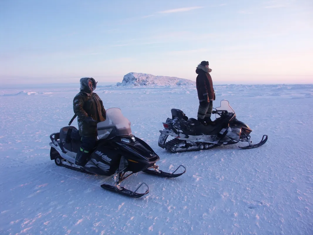 researchers on the ice