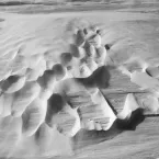 Photo of wind-sculpted snow surface