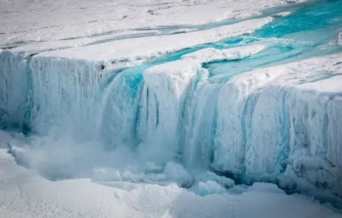 Waterfall of meltwater from Nansen Ice Shelf.